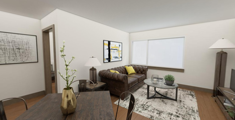 a living room with a couch and a table